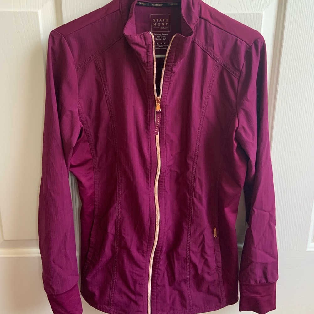 Gently used wine-colored scrub jacket
